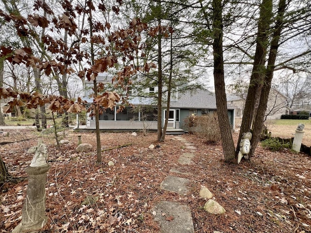 exterior space with a sunroom