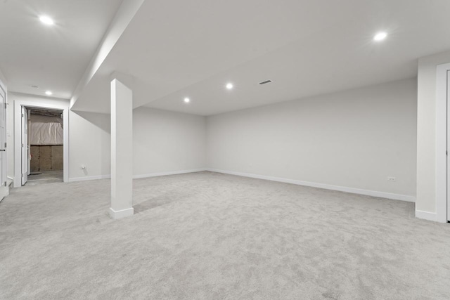 basement with light carpet