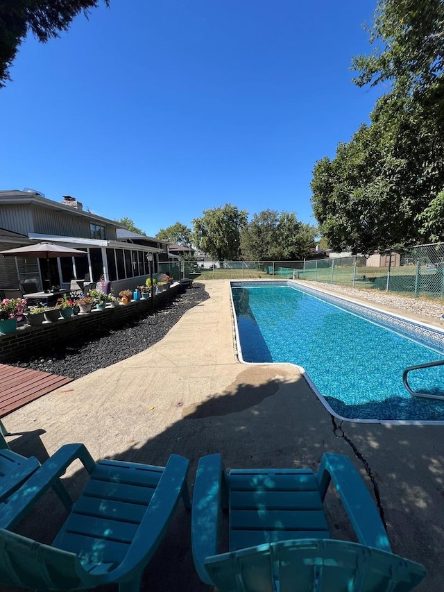 view of pool with a water slide