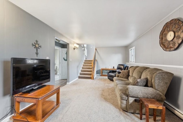 carpeted living room with ornamental molding