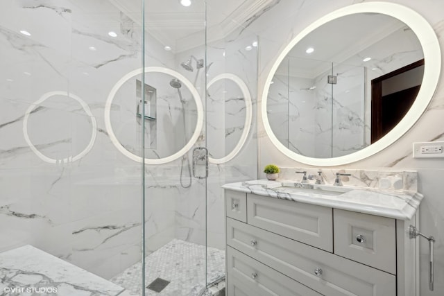 bathroom featuring vanity, ornamental molding, and walk in shower