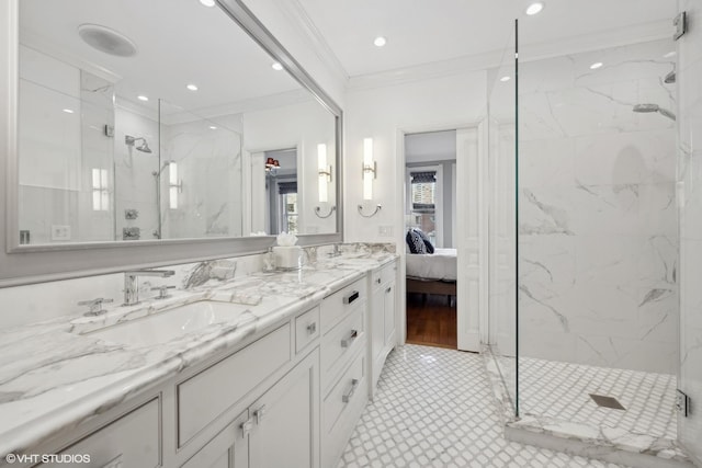 bathroom featuring an enclosed shower, sink, tile patterned flooring, and ornamental molding