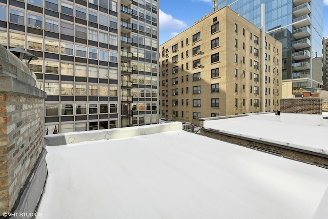 view of snow covered property