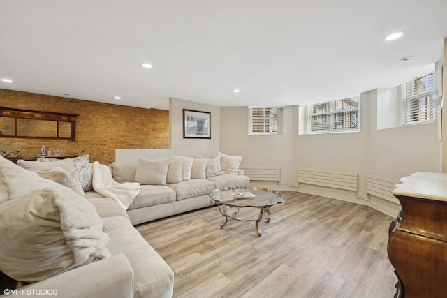 living room with light hardwood / wood-style flooring