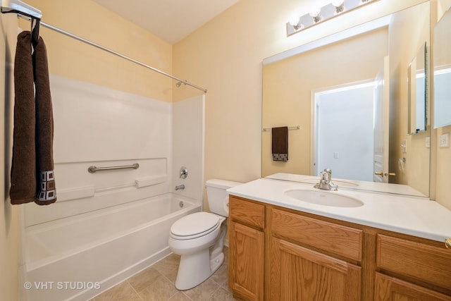 full bathroom with tile patterned floors, vanity, shower / bathing tub combination, and toilet