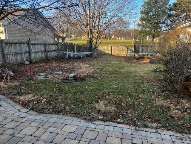 view of yard featuring a trampoline