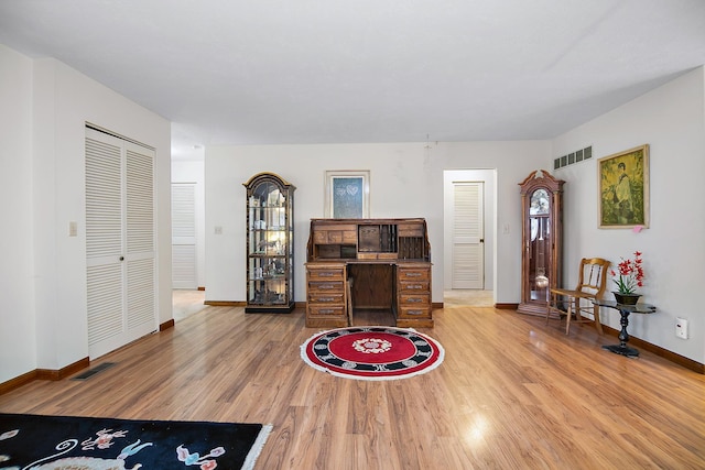 living room with wood-type flooring