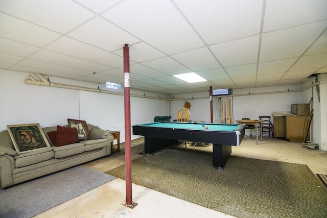 rec room with a drop ceiling, pool table, and concrete floors