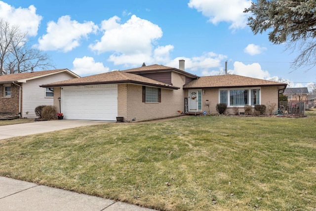 view of front facade featuring a garage and a front lawn