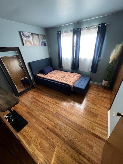 bedroom featuring hardwood / wood-style flooring