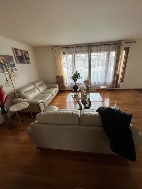 living room with hardwood / wood-style floors