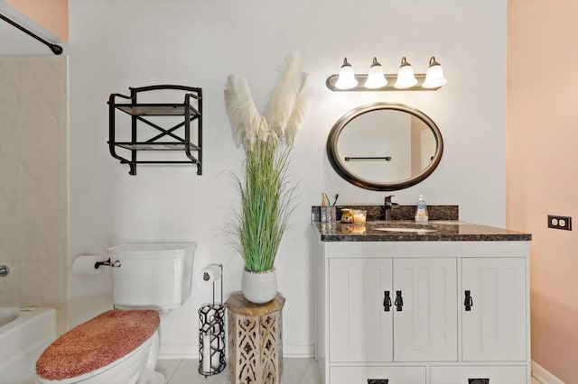 full bathroom with tiled shower / bath combo, vanity, and toilet