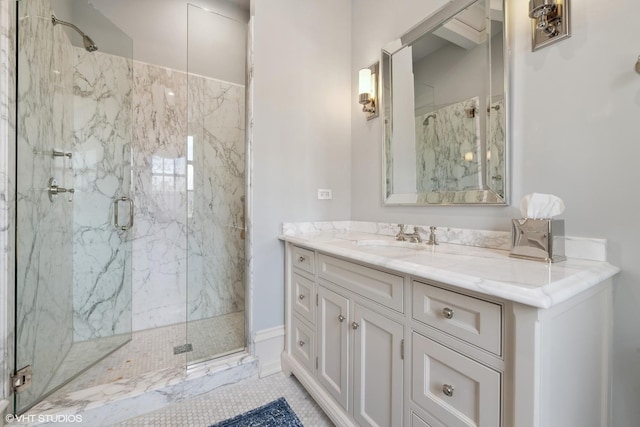 bathroom featuring vanity and a shower with door