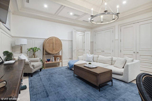 living room with a notable chandelier, beam ceiling, crown molding, and coffered ceiling