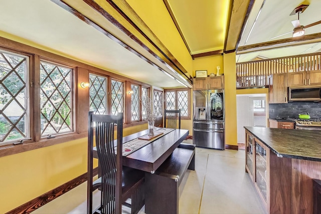 dining room with baseboards