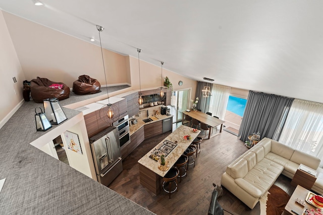 living room with dark hardwood / wood-style flooring