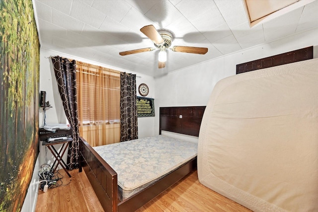 bedroom featuring ceiling fan and light wood-type flooring