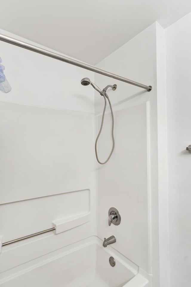 bathroom with shower / bath combination