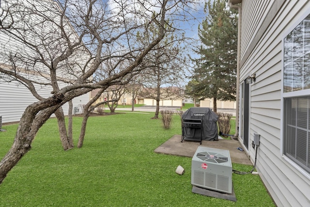 view of yard with a patio and cooling unit