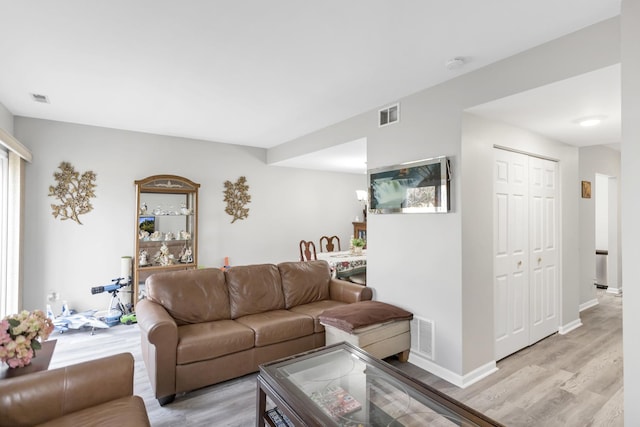 living room featuring light wood-type flooring