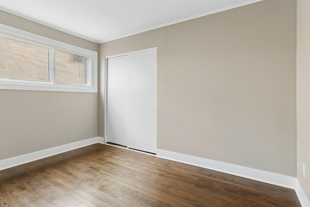 empty room featuring hardwood / wood-style flooring