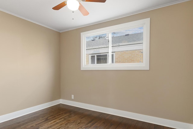 unfurnished room featuring dark hardwood / wood-style flooring, ceiling fan, and ornamental molding