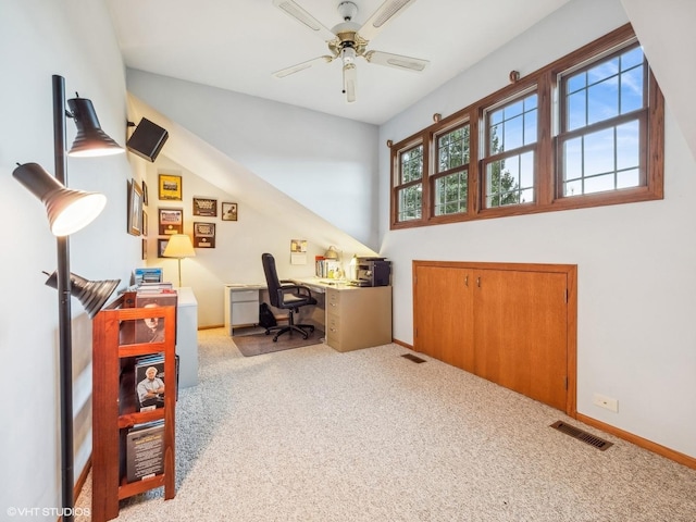 carpeted home office with ceiling fan