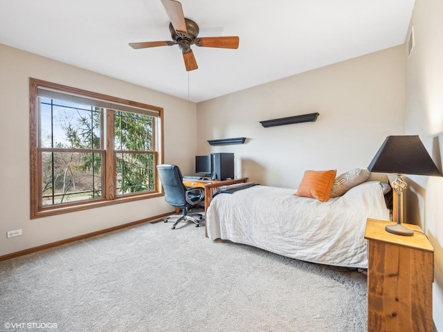 bedroom with ceiling fan and carpet floors