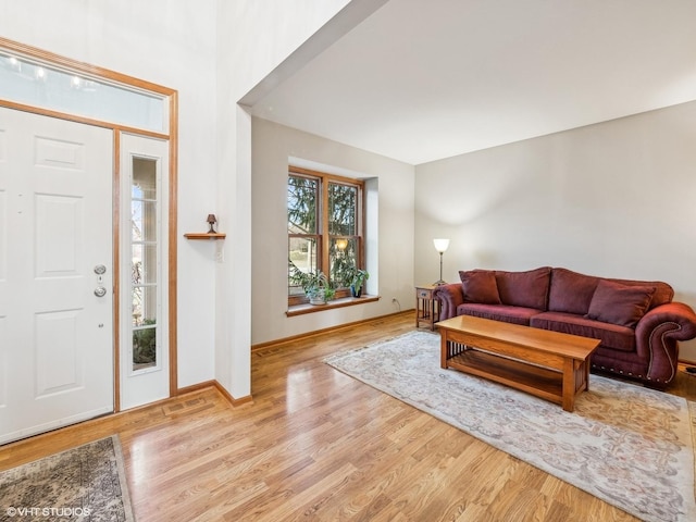 entrance foyer with light hardwood / wood-style flooring