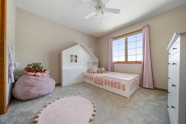 carpeted bedroom with ceiling fan