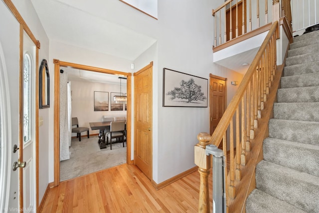 foyer entrance with light wood-type flooring