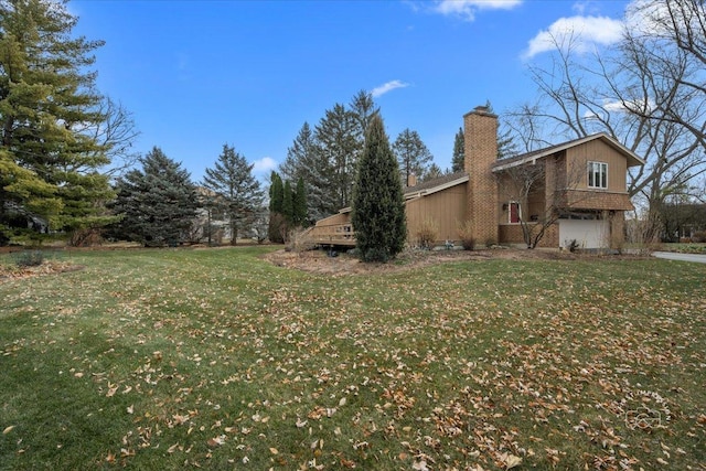 view of yard with a garage