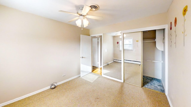 unfurnished bedroom featuring carpet, a closet, a baseboard radiator, and ceiling fan