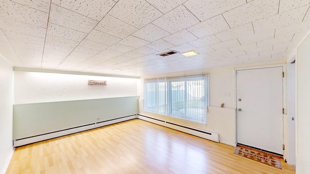 interior space with hardwood / wood-style floors