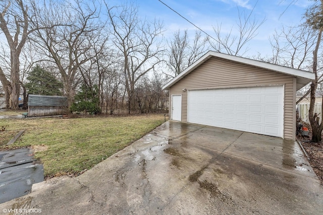 garage with a yard