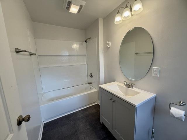 bathroom with vanity and  shower combination