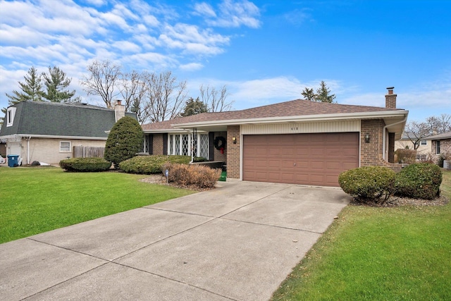 single story home featuring a front yard and a garage