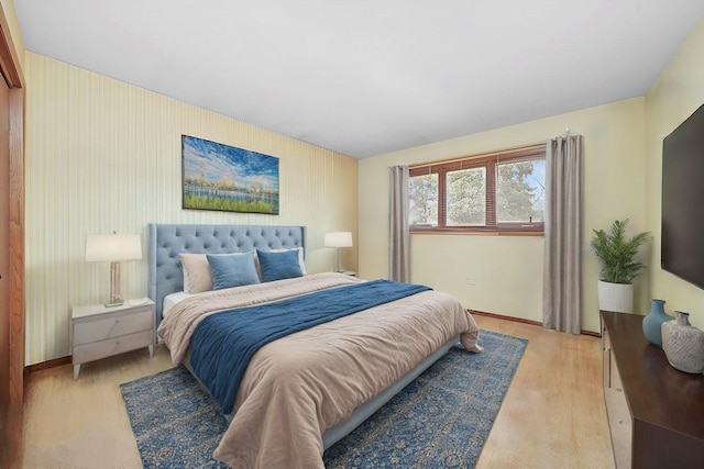 bedroom with light hardwood / wood-style flooring