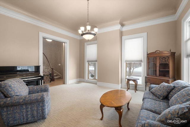 living room with light colored carpet, ornamental molding, and a notable chandelier