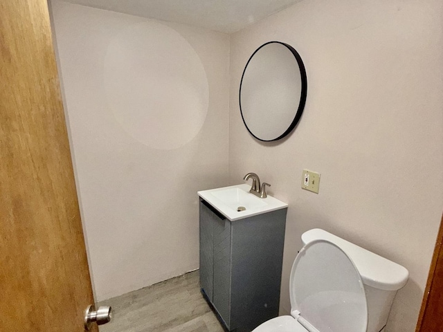 7618 S Rhodes Ave, Chicago, IL 60619 - bathroom featuring toilet and vanity