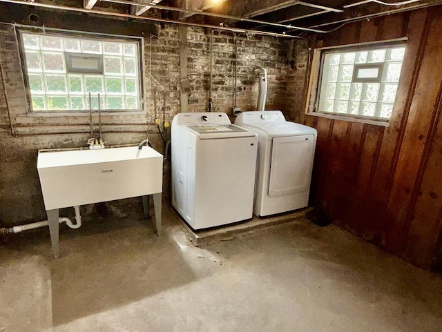 7618 S Rhodes Ave, Chicago, IL 60619 - laundry area with washing machine and dryer and a sink