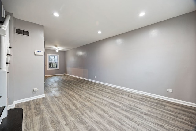 unfurnished living room featuring light wood-type flooring