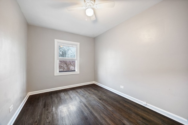 empty room featuring hardwood / wood-style floors and ceiling fan