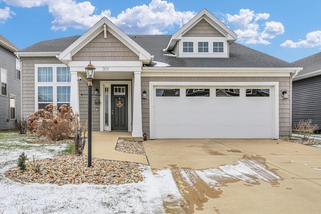 view of front of property featuring a garage