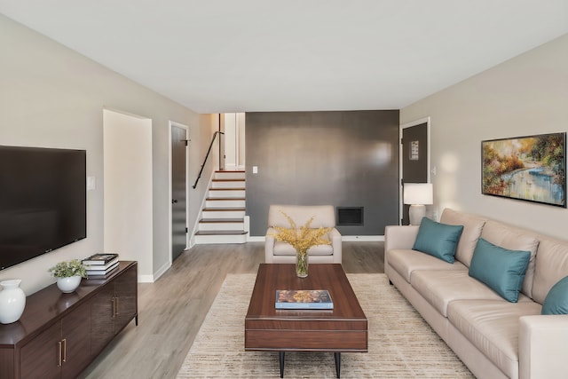 living room with light hardwood / wood-style floors