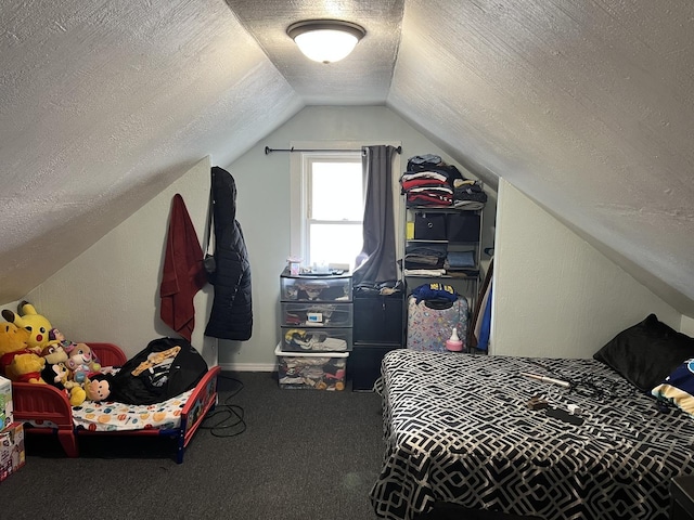 bedroom featuring carpet flooring, lofted ceiling, and a textured ceiling