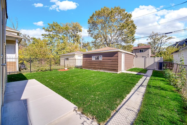 view of yard featuring a storage unit