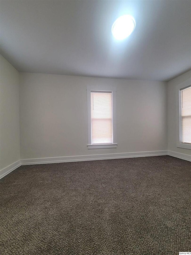 view of carpeted spare room