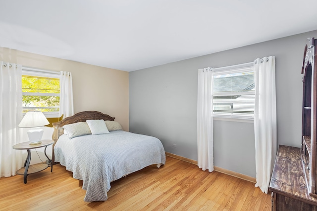 bedroom featuring light wood-type flooring