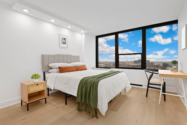 bedroom featuring light hardwood / wood-style flooring